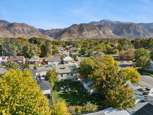 View of mountain background featuring nearby suburban area