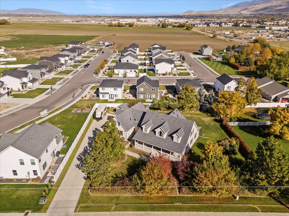 Aerial view of residential area with a mountainous background