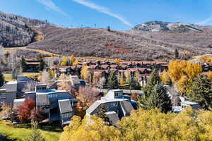 Aerial perspective of suburban area featuring mountains