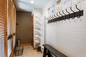 Mudroom featuring light tile patterned floors and recessed lighting