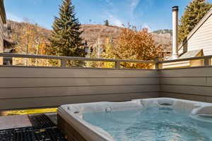 Balcony with an outdoor hot tub