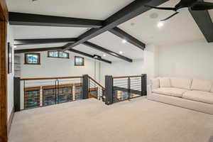 Bonus room featuring carpet, beamed ceiling, and recessed lighting