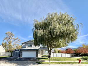 Home on corner lot, large yards, fully fenced, large RV parking, 2-car garage, solar panels!