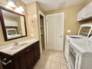 Laundry room and bathroom shared space.