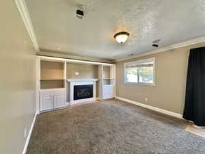 Family room with fireplace and door to backyard on right.  Door to garage on left.  Surround sound.