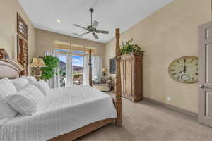 Bedroom featuring carpet floors, access to exterior, recessed lighting, a ceiling fan, and a mountain view
