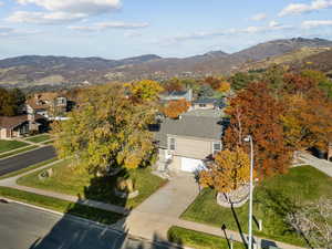 View of property location with a mountainous background and nearby suburban area