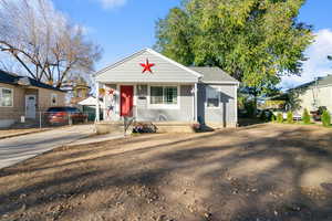 Bungalow-style house featuring covered porch