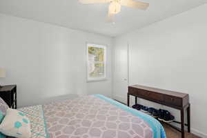 Bedroom featuring carpet floors and a ceiling fan