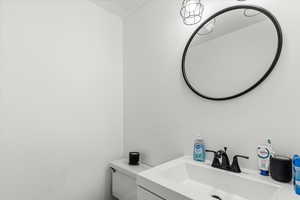 Bathroom with vanity and toilet