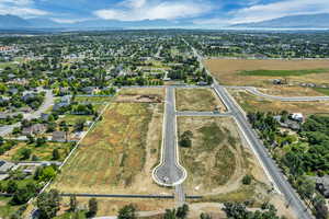 Aerial overview of property's location with a mountainous background