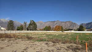 View of mountain background featuring rural landscape