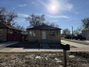 View of front of property with brick siding