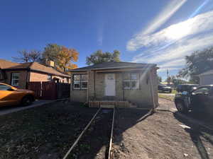 Bungalow-style house featuring brick siding