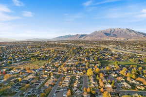 View of property location with nearby suburban area and a mountainous background