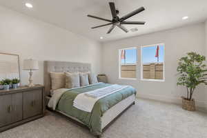 Bedroom featuring recessed lighting, carpet, and a ceiling fan