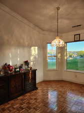 Unfurnished dining area featuring baseboards