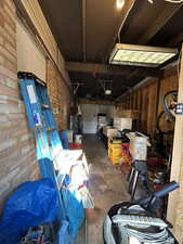 Garage featuring a garage door opener