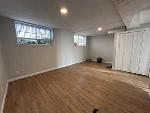Basement featuring wood finished floors and recessed lighting