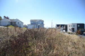 View of yard featuring a residential view