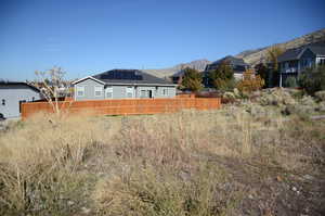 View of yard with a mountain view and a residential view