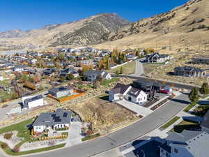 Aerial view of residential area with a mountainous background