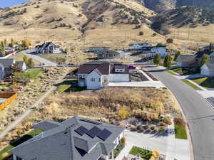 Aerial view of residential area with a mountainous background