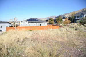 View of yard featuring a mountain view and a residential view