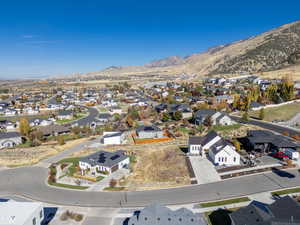 Aerial view of residential area with a mountainous background