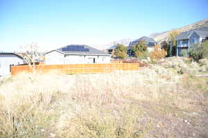 View of yard featuring a mountain view and a residential view