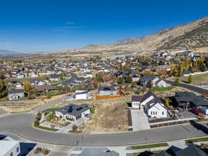 Aerial perspective of suburban area with mountains