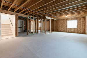 Basement featuring stairway and large living area
