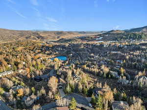 View of property location featuring a water and mountain view