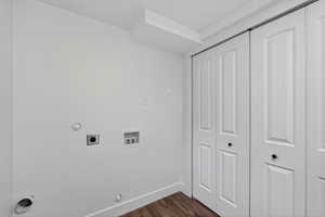 Laundry area featuring hookup for a gas dryer, dark wood-style floors, electric dryer hookup, and washer hookup