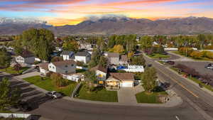 Aerial view at dusk of a mountain view and a residential view