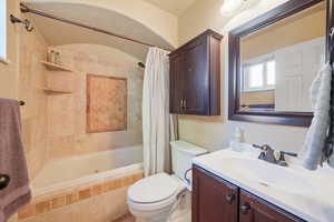 Full bathroom with vanity and tiled shower / bath combo