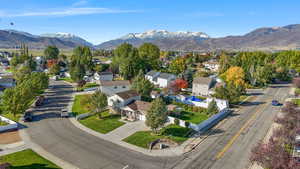 Aerial view of residential area featuring mountains