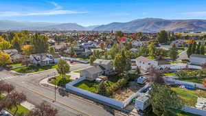 Aerial perspective of suburban area featuring mountains