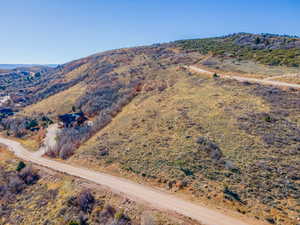 View of subject property with a mountain backdrop