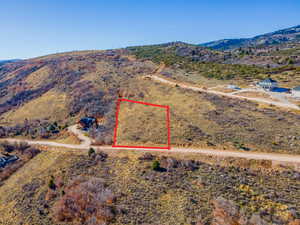 View of property location featuring property boundaries highlighted and a mountain backdrop