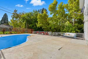 View of pool with a patio area