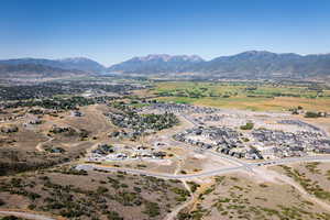 Aerial view of residential area with a mountain backdrop