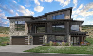 View of front of property featuring a balcony, concrete driveway, a garage, and stone siding