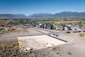 View of mountain background featuring nearby suburban area