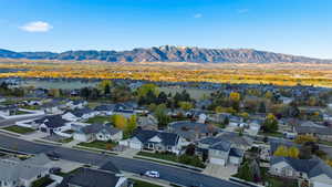 Aerial view of residential area featuring mountains