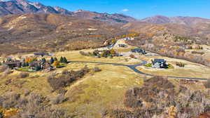 Aerial overview of property's location featuring mountains