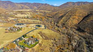 Aerial view of property's location featuring mountains