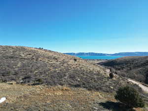View of mountain background featuring a large body of water
