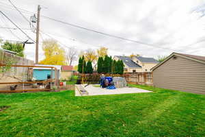 Fenced backyard featuring a patio area