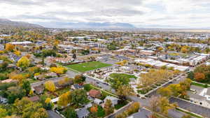 View of property location with a mountainous background and nearby suburban area